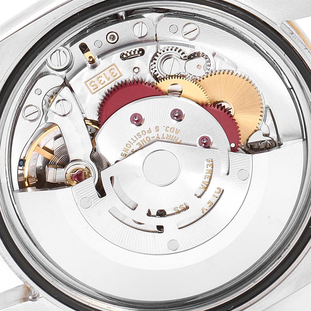 The image shows a close-up view of the movement mechanism inside the Rolex Turn-o-Graph 116263 Men
s Stainless Steel White Dial 116263 Men
s Stainless Steel White Dial watch.
