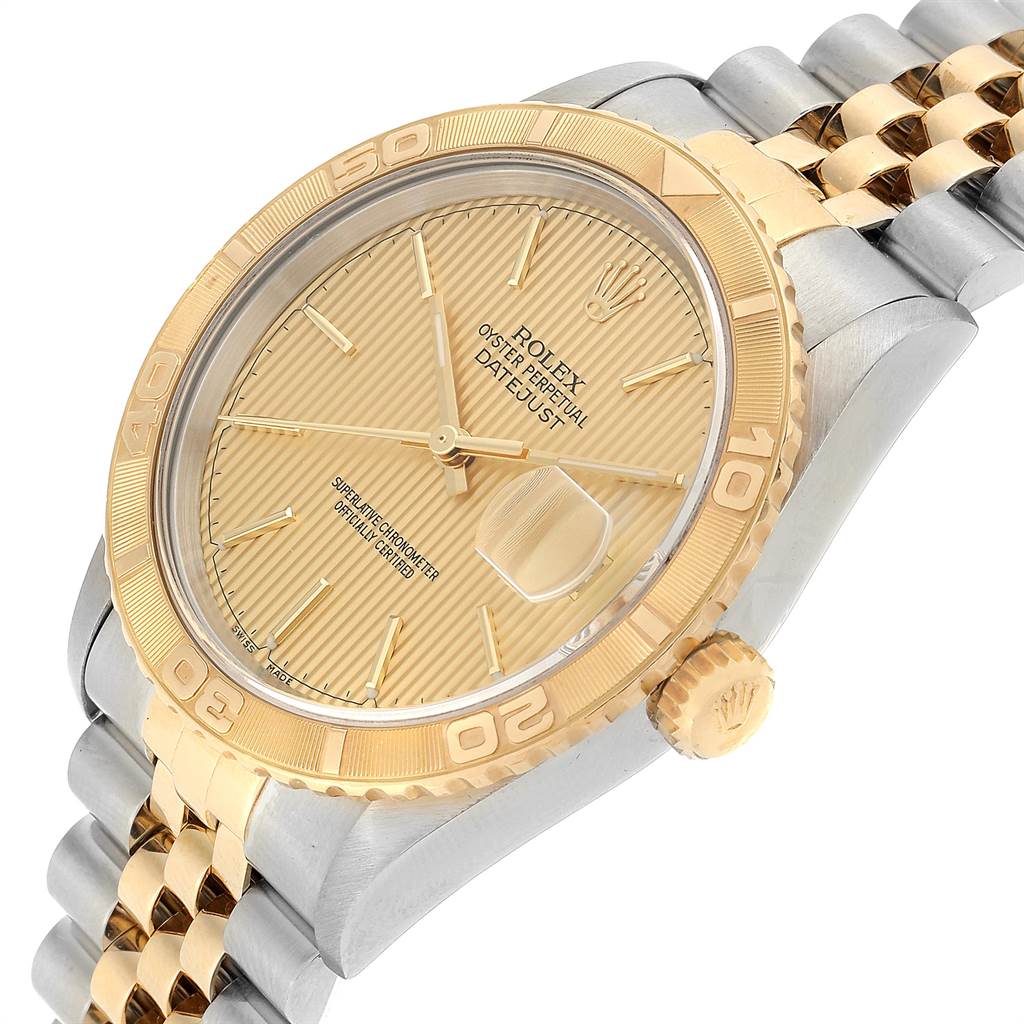 This image shows a Rolex Turn-o-Graph 16263 Men
s Steel and Gold (two tone) Champagne Dial 16263 Men
s Steel and Gold (two tone) Champagne Dial watch at an angled view, highlighting the dial, bezel, crown, and bracelet.
