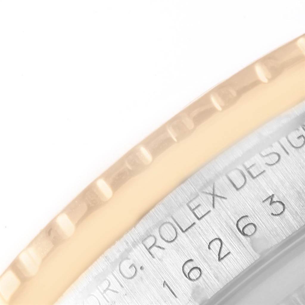 The image shows a close-up of the bezel and part of the case of a Rolex Turn-o-Graph 16263 Men
s Steel and Gold (two tone) Champagne Dial 16263 Men
s Steel and Gold (two tone) Champagne Dial watch.