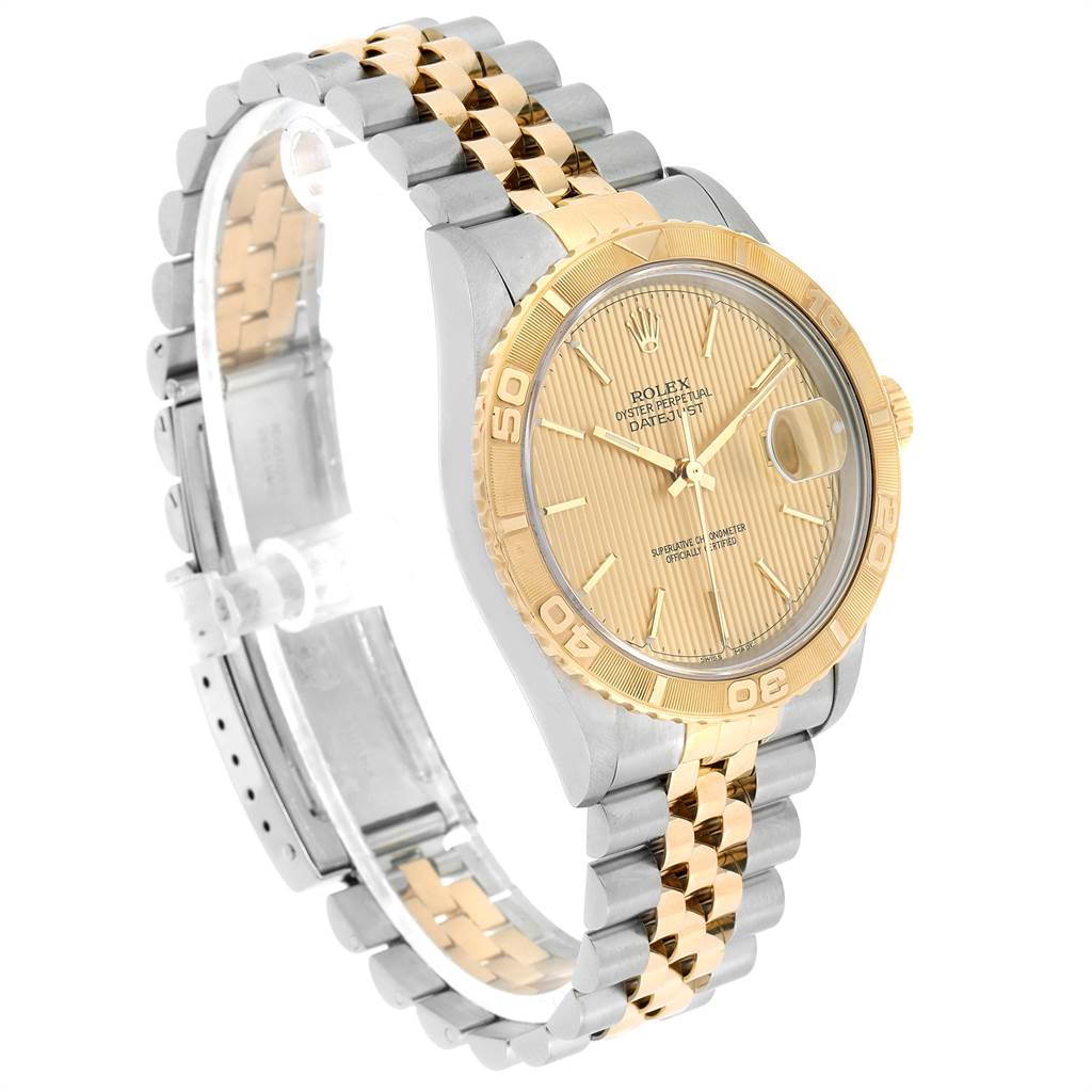 The image shows a side and upper view of a Rolex Turn-o-Graph 16263 Men
s Steel and Gold (two tone) Champagne Dial 16263 Men
s Steel and Gold (two tone) Champagne Dial watch, highlighting its bezel, dial, and two-tone bracelet.