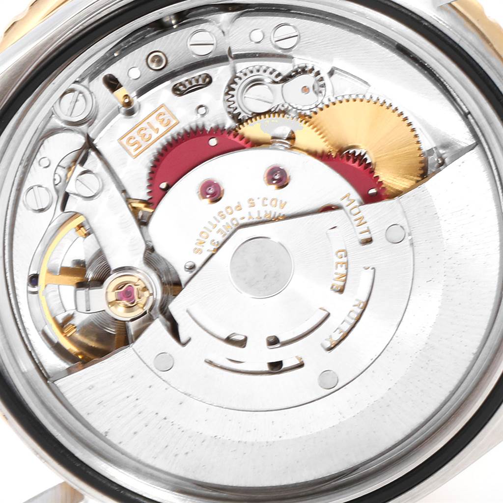 This image shows a close-up of the internal movement and components of a Rolex Turn-o-Graph 16263 Men
s Steel and Gold (two tone) Beige Dial 16263 Men
s Steel and Gold (two tone) Beige Dial watch.