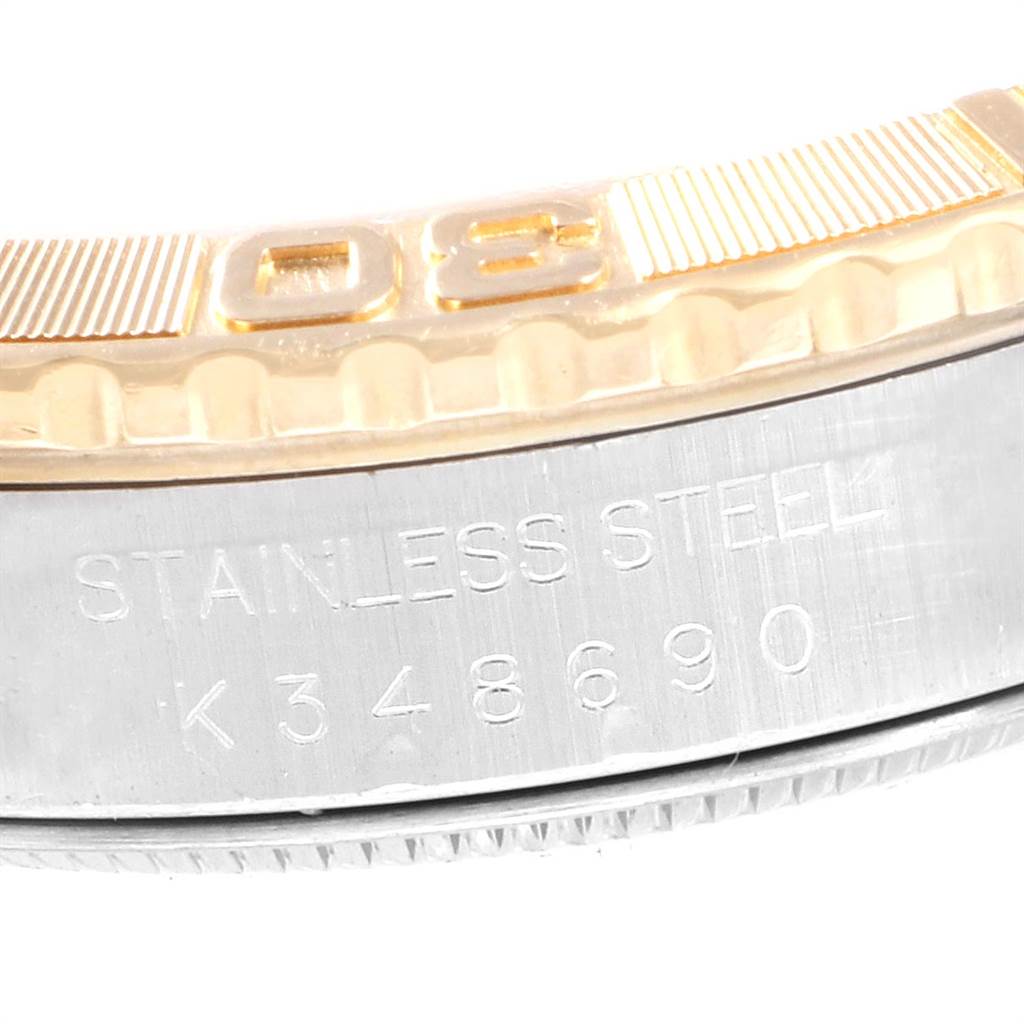 This image shows a close-up of the bezel and case edge with engravings on the Rolex Turn-o-Graph 16263 Men
s Steel and Gold (two tone) Beige Dial 16263 Men
s Steel and Gold (two tone) Beige Dial watch.