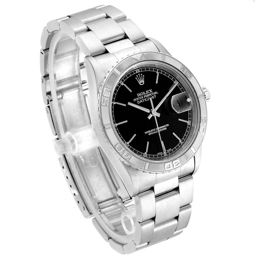 The image shows a side angle of the Rolex Turn-o-Graph 16264 Men's Stainless Steel Black Dial 16264 Men's Stainless Steel Black Dial watch, displaying its bezel, dial, bracelet, and crown.