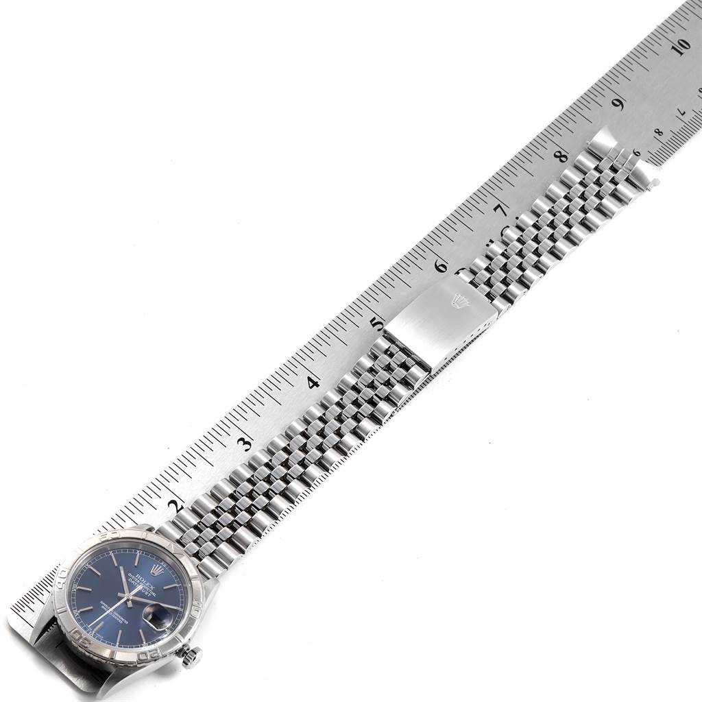 The image shows a Rolex Turn-o-Graph 16264 Men's Stainless Steel Blue Dial 16264 Men's Stainless Steel Blue Dial watch laid flat next to a ruler, illustrating the length and bracelet details.