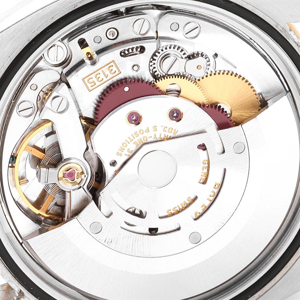 This is a close-up view of the movement mechanism of the Rolex Turn-o-Graph 116263 Men
s Stainless Steel Champagne Dial 116263 Men
s Stainless Steel Champagne Dial watch.