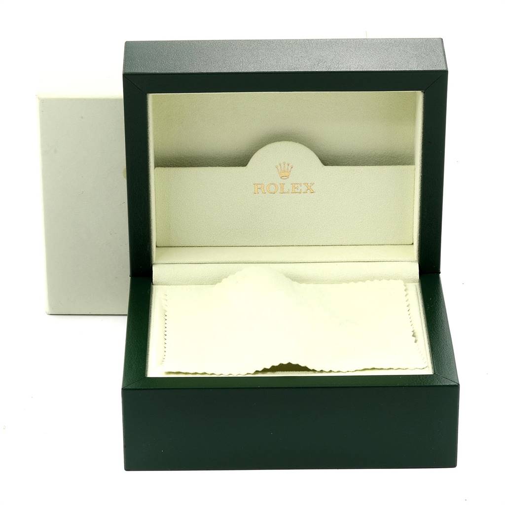 The image shows an open green Rolex Turn-o-Graph 16264 Men
s Stainless Steel White Dial 16264 Men
s Stainless Steel White Dial watch box with a cream interior and a cloth inside.