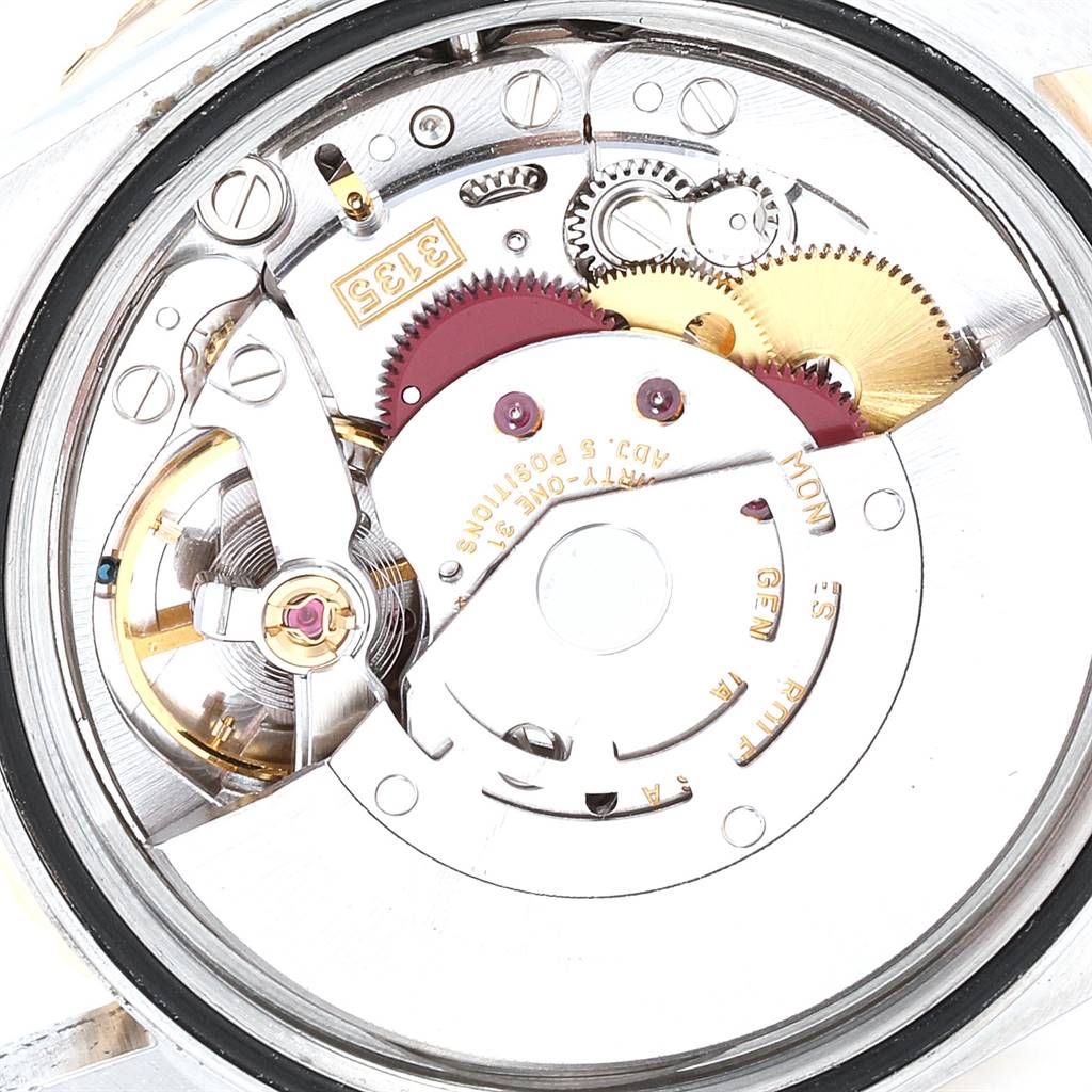 The image shows a close-up view of the internal movement parts of a Rolex Turn-o-Graph 16263 Men
s Steel and Gold (two tone) White Dial 16263 Men
s Steel and Gold (two tone) White Dial watch.