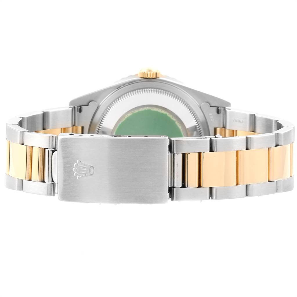 The image shows the back view of the Rolex Turn-o-Graph 16263 Men
s Steel and Gold (two tone) White Dial 16263 Men
s Steel and Gold (two tone) White Dial watch, highlighting its clasp and bi-metal bracelet.