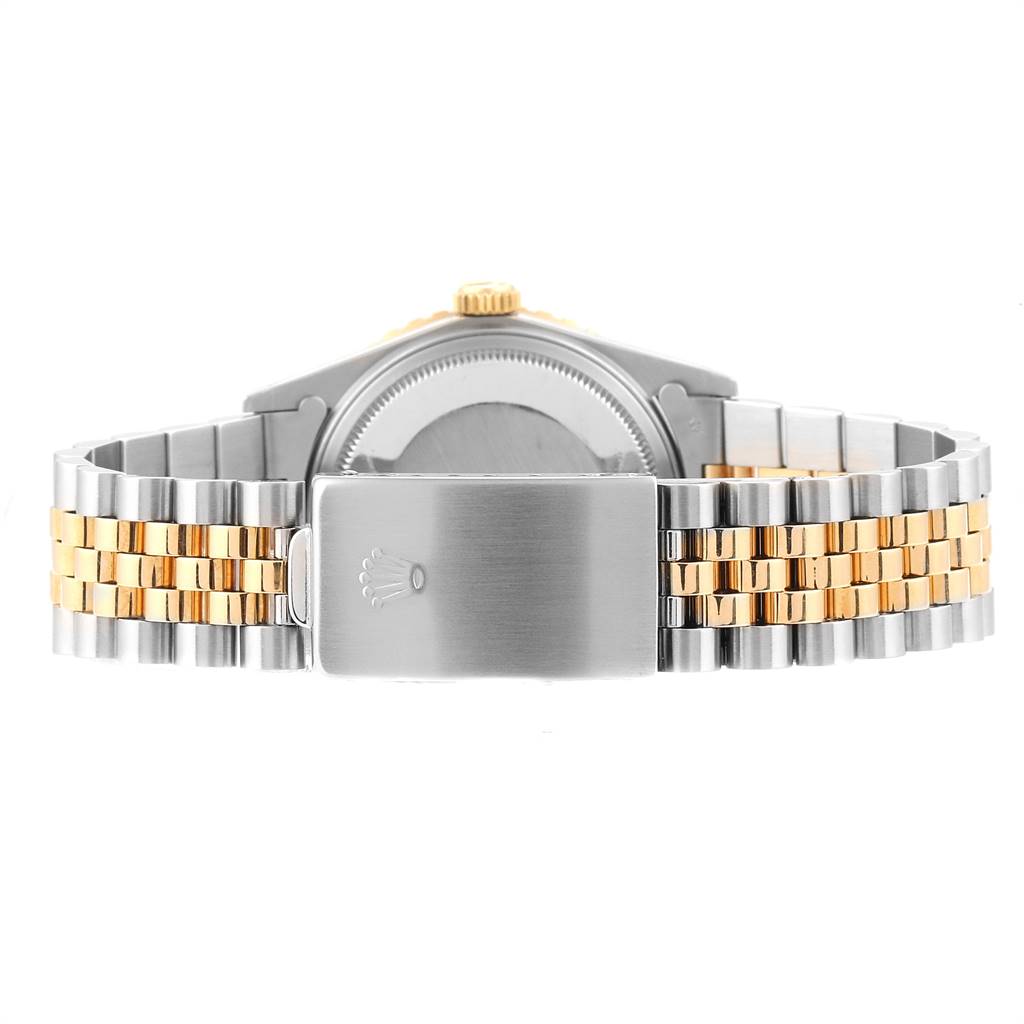 The image shows the back view of a Rolex Turn-o-Graph 16253 Men
s Steel and Gold (two tone) Blue Dial 16253 Men
s Steel and Gold (two tone) Blue Dial watch, focusing on the clasp and bracelet.