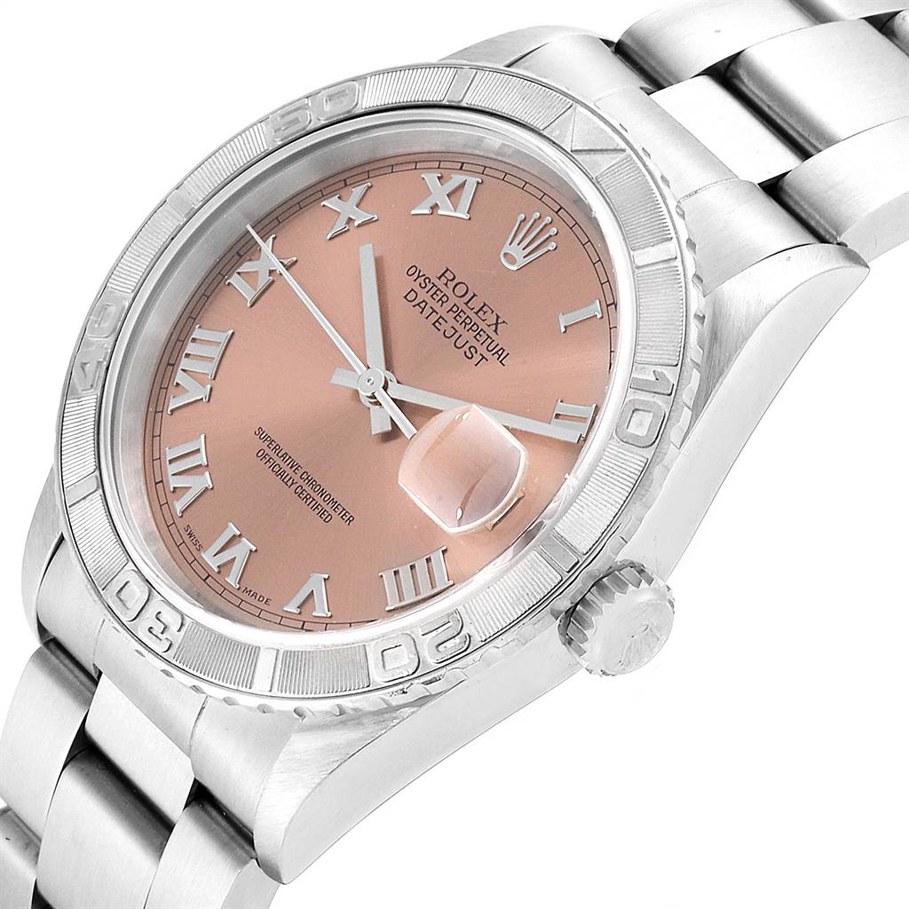 The image shows the face, bezel, and part of the bracelet of a Rolex Turn-o-Graph 16264 Men
s Stainless Steel Pink Dial 16264 Men
s Stainless Steel Pink Dial watch at a slightly angled view.