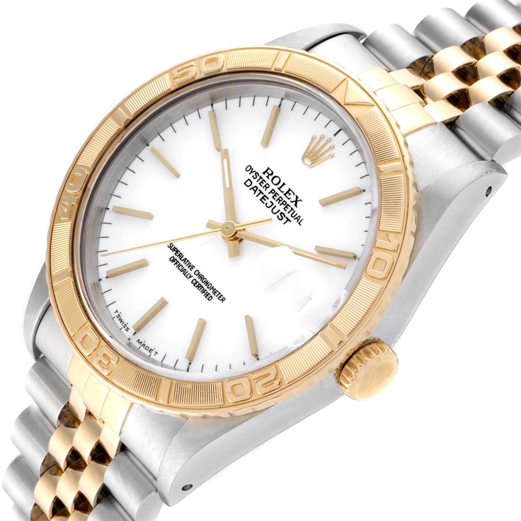 The image shows a close-up angle of the Rolex Turn-o-Graph 16263 Men's Steel and Gold (two tone) White Dial 16263 Men's Steel and Gold (two tone) White Dial watch, highlighting its bezel, dial, and part of the bracelet.