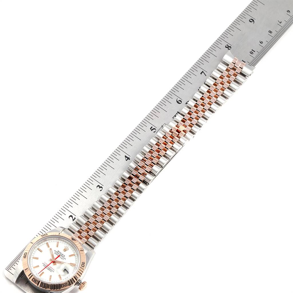 The image shows a Rolex Turn-o-Graph 116261 Men's Stainless Steel White Dial 116261 Men's Stainless Steel White Dial watch lying flat, with its face and bracelet visible, next to a ruler for measurement.