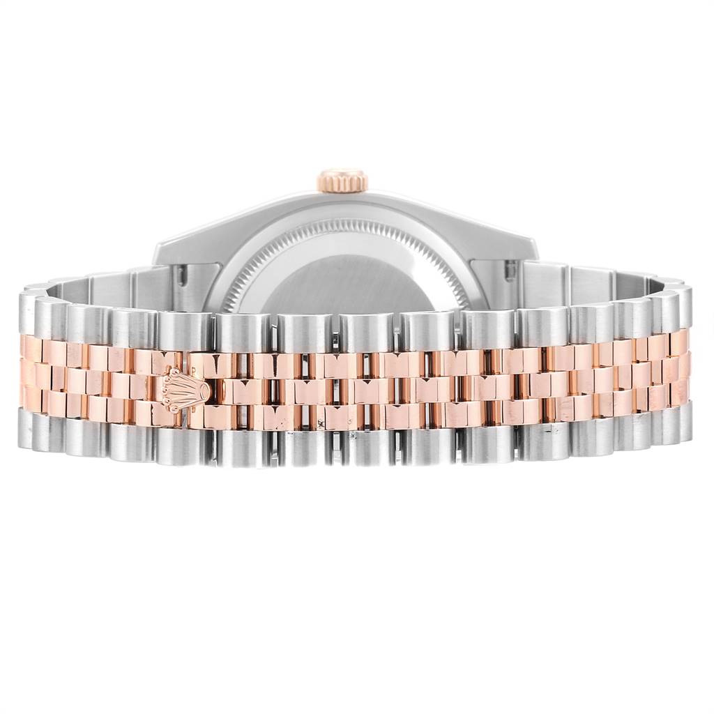 The image shows the backside of the Rolex Turn-o-Graph 116261 Men's Stainless Steel White Dial 116261 Men's Stainless Steel White Dial model, focusing on the bicolor metal bracelet and the back of the watch case.