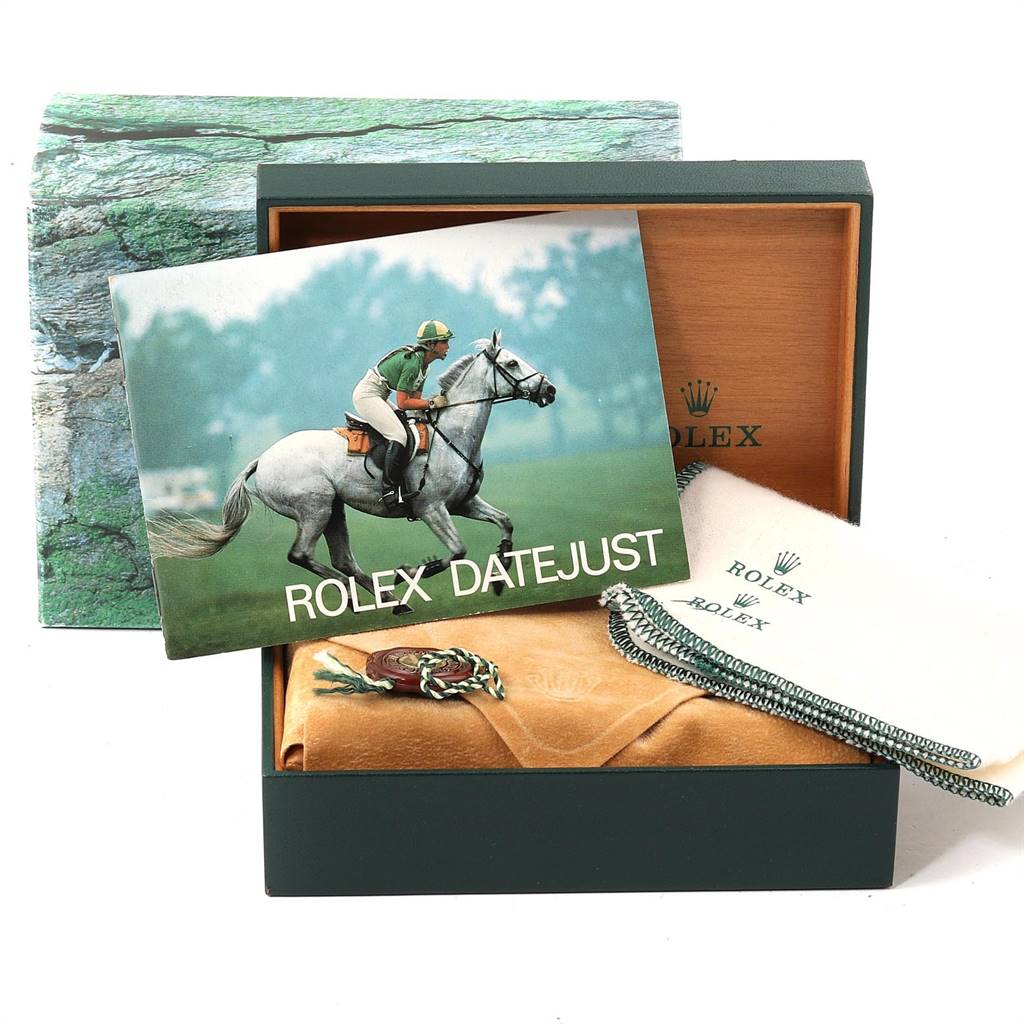 This image shows a Rolex Turn-o-Graph 16264 Men
s Stainless Steel Blue Dial 16264 Men
s Stainless Steel Blue Dial watch box, accessories, and a Rolex Datejust booklet taken from a top-down angle.