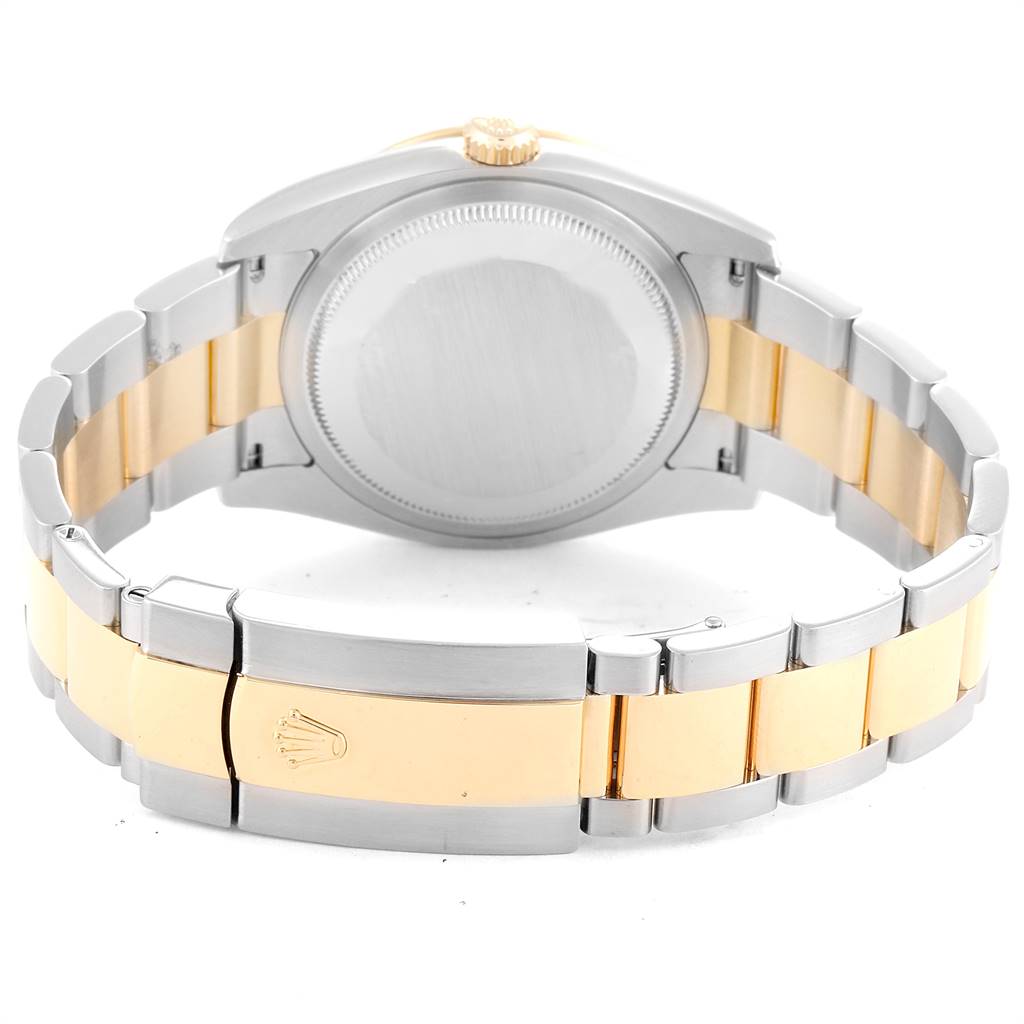 The image shows the back and bracelet of a Rolex Turn-o-Graph 116263 Men
s Steel and Gold (two tone) Champagne Dial 116263 Men
s Steel and Gold (two tone) Champagne Dial watch from a rear angle.