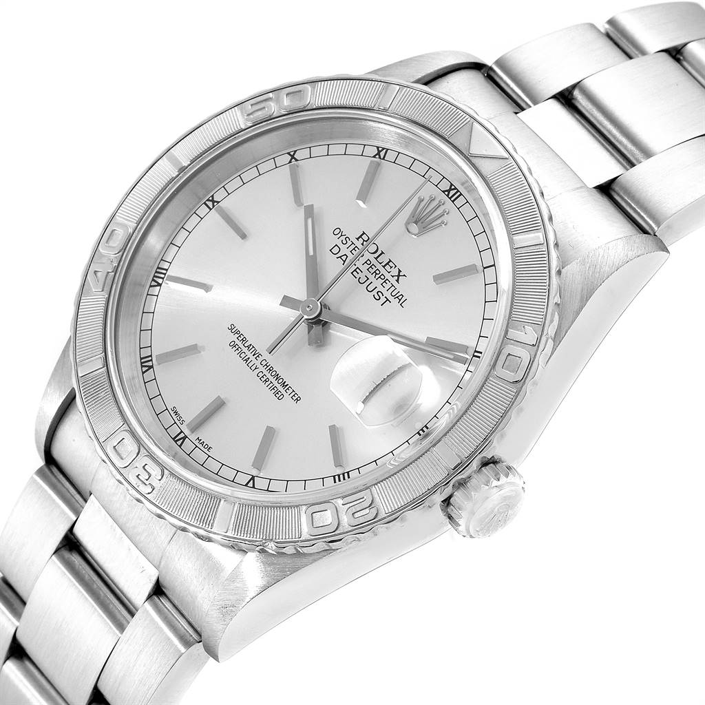 The image shows a Rolex Turn-o-Graph 16264 Men
s Stainless Steel Silver Dial 16264 Men
s Stainless Steel Silver Dial watch from a slight side angle, highlighting the dial, bezel, crown, and part of the bracelet.