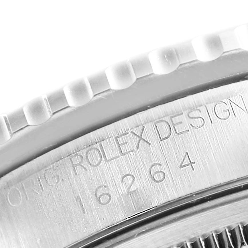 The image shows a close-up of the engraved bezel and case of the Rolex Turn-o-Graph 16264 Men
s Stainless Steel Silver Dial 16264 Men
s Stainless Steel Silver Dial model 16264.