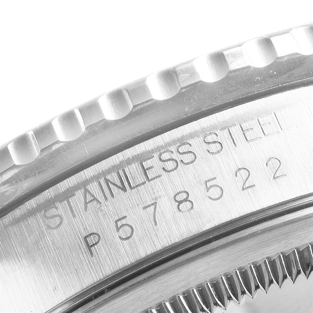This image shows a close-up angled view of the stainless steel bezel and serial number of a Rolex Turn-o-Graph 16264 Men
s Stainless Steel White Dial 16264 Men
s Stainless Steel White Dial watch.