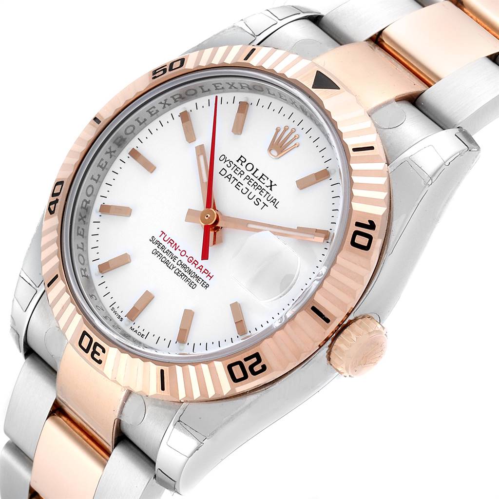 The image shows a close-up, angled view of the face, bezel, crown, and part of the bracelet of a Rolex Turn-o-Graph 116261 Men's Steel and Gold (two tone) White Dial 116261 Men's Steel and Gold (two tone) White Dial watch.