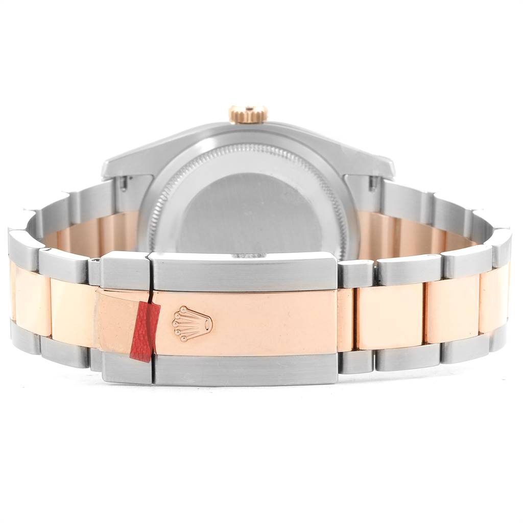 The image shows the back of a Rolex Turn-o-Graph 116261 Men's Steel and Gold (two tone) White Dial 116261 Men's Steel and Gold (two tone) White Dial model, focusing on the clasp and case back.