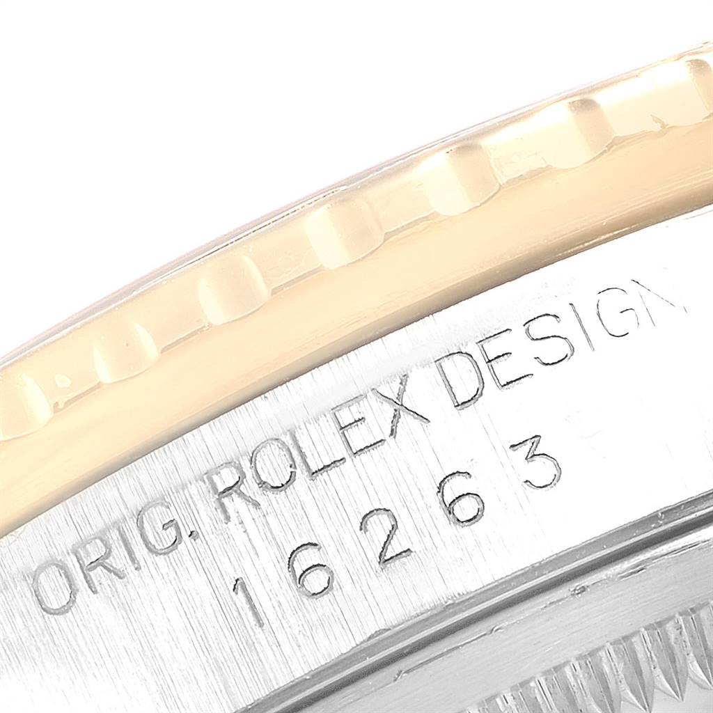 The image shows a close-up of the bezel and case side of a Rolex Turn-o-Graph 16263 Men
s Steel and Gold (two tone) Grey Dial 16263 Men
s Steel and Gold (two tone) Grey Dial watch, highlighting its design details and model number 16263.
