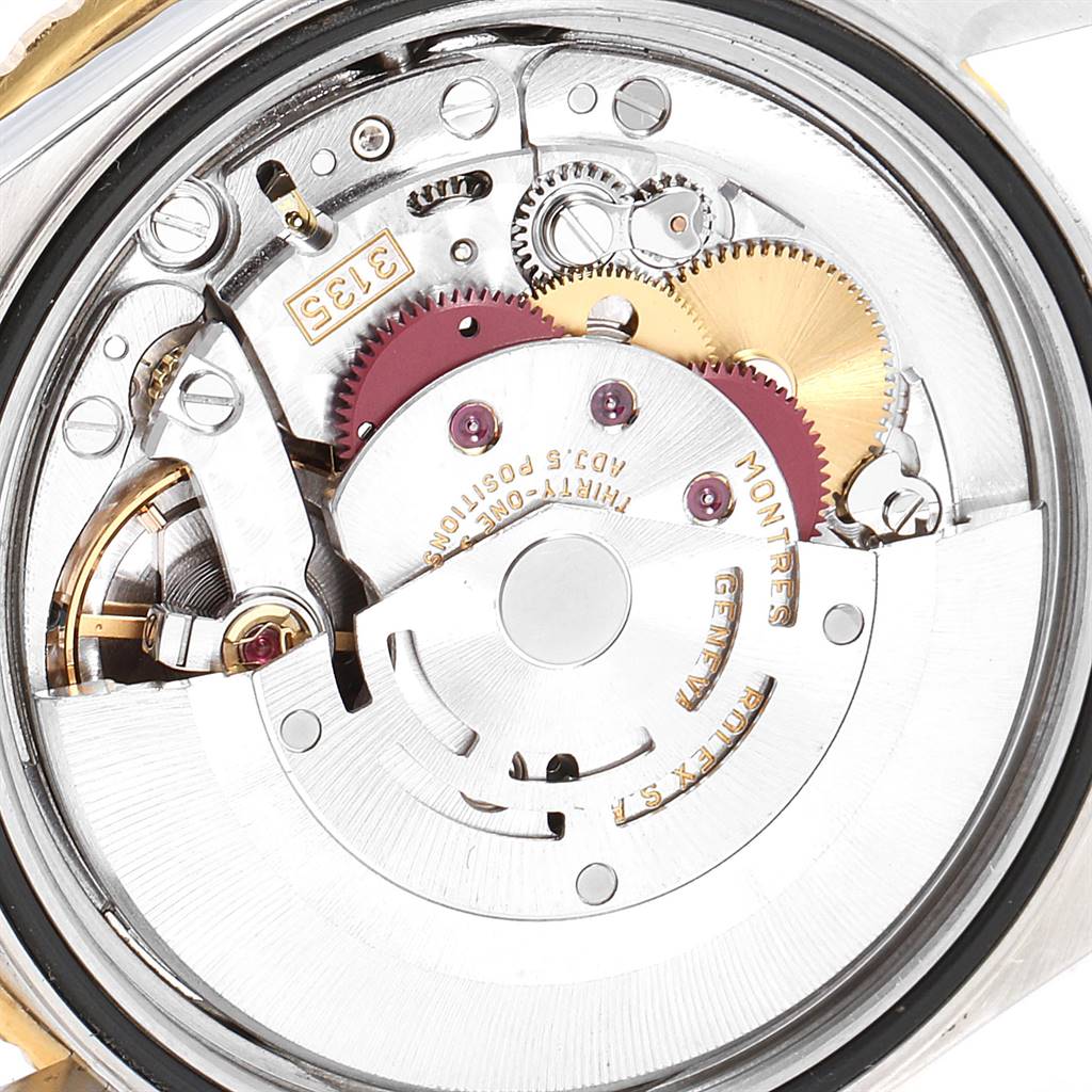 The image shows an up-close view of the intricate internal mechanism of a Rolex Turn-o-Graph 16263 Men
s Steel and Gold (two tone) Grey Dial 16263 Men
s Steel and Gold (two tone) Grey Dial watch.