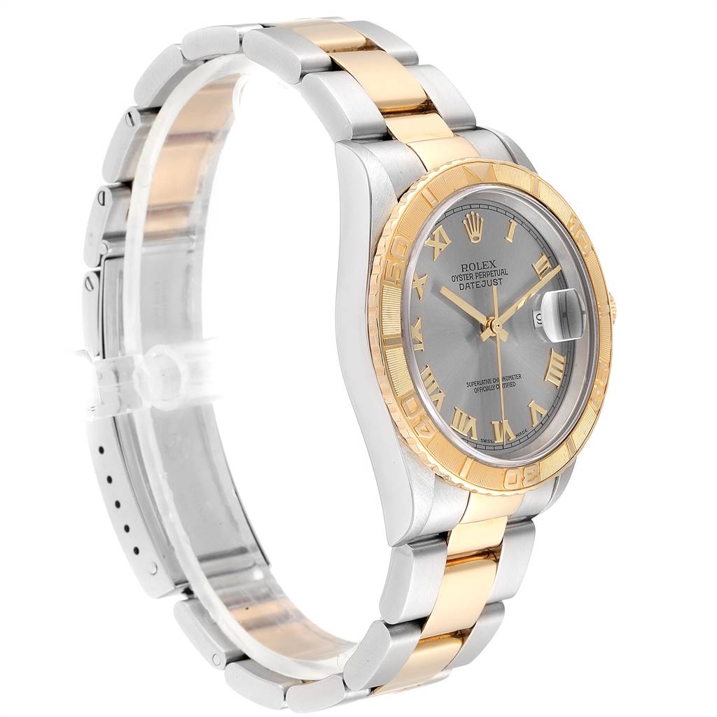 The image shows a side-angle view of a Rolex Turn-o-Graph 16263 Men
s Steel and Gold (two tone) Grey Dial 16263 Men
s Steel and Gold (two tone) Grey Dial watch, highlighting its bracelet, bezel, and dial.