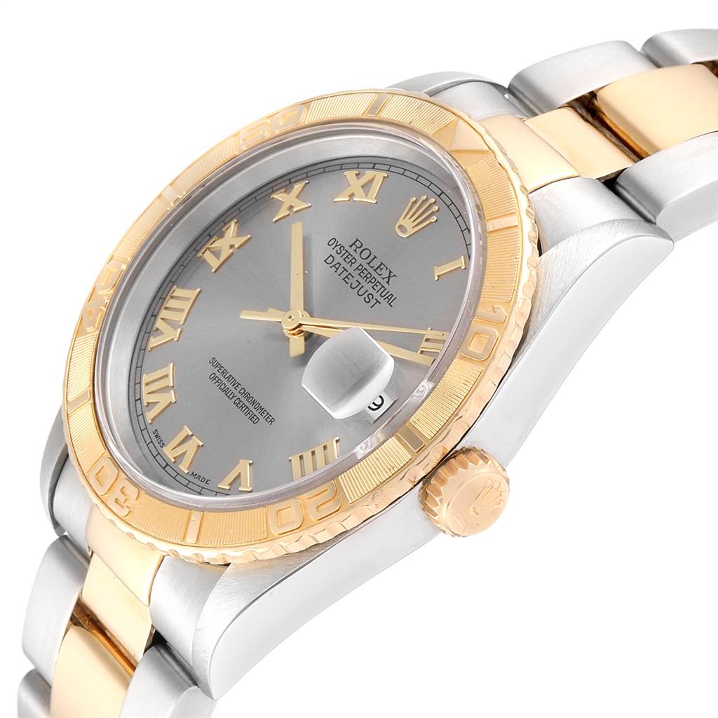 This image shows a Rolex Turn-o-Graph 16263 Men
s Steel and Gold (two tone) Grey Dial 16263 Men
s Steel and Gold (two tone) Grey Dial watch at an angle, highlighting the bezel, face, crown, and part of the bracelet.