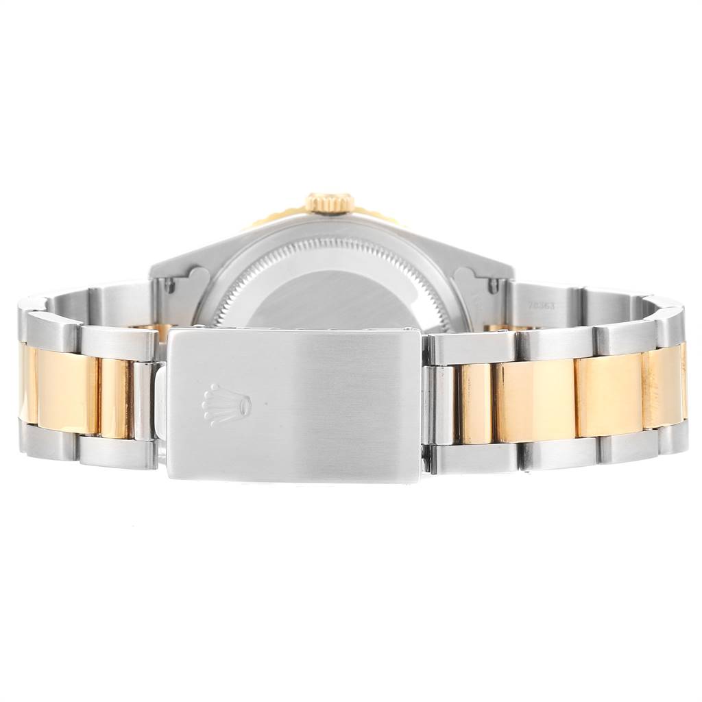 The image shows the back and clasp of a Rolex Turn-o-Graph 16263 Men
s Steel and Gold (two tone) Grey Dial 16263 Men
s Steel and Gold (two tone) Grey Dial watch, focusing on its two-tone bracelet.
