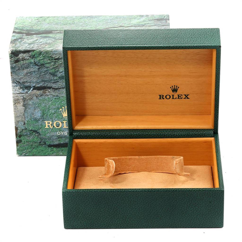 The image shows an open Rolex Turn-o-Graph 16263 Men
s Steel and Gold (two tone) Grey Dial 16263 Men
s Steel and Gold (two tone) Grey Dial watch box with green exterior and wooden interior.