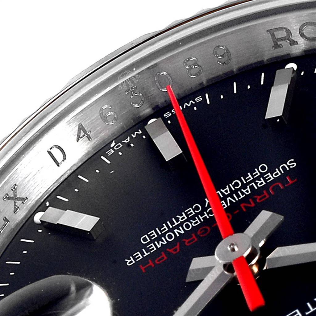 The image shows a close-up of the dial and bezel of a Rolex Turn-o-Graph 116264 Men
s Stainless Steel Black Dial 116264 Men
s Stainless Steel Black Dial, highlighting the red second hand and hour markers.