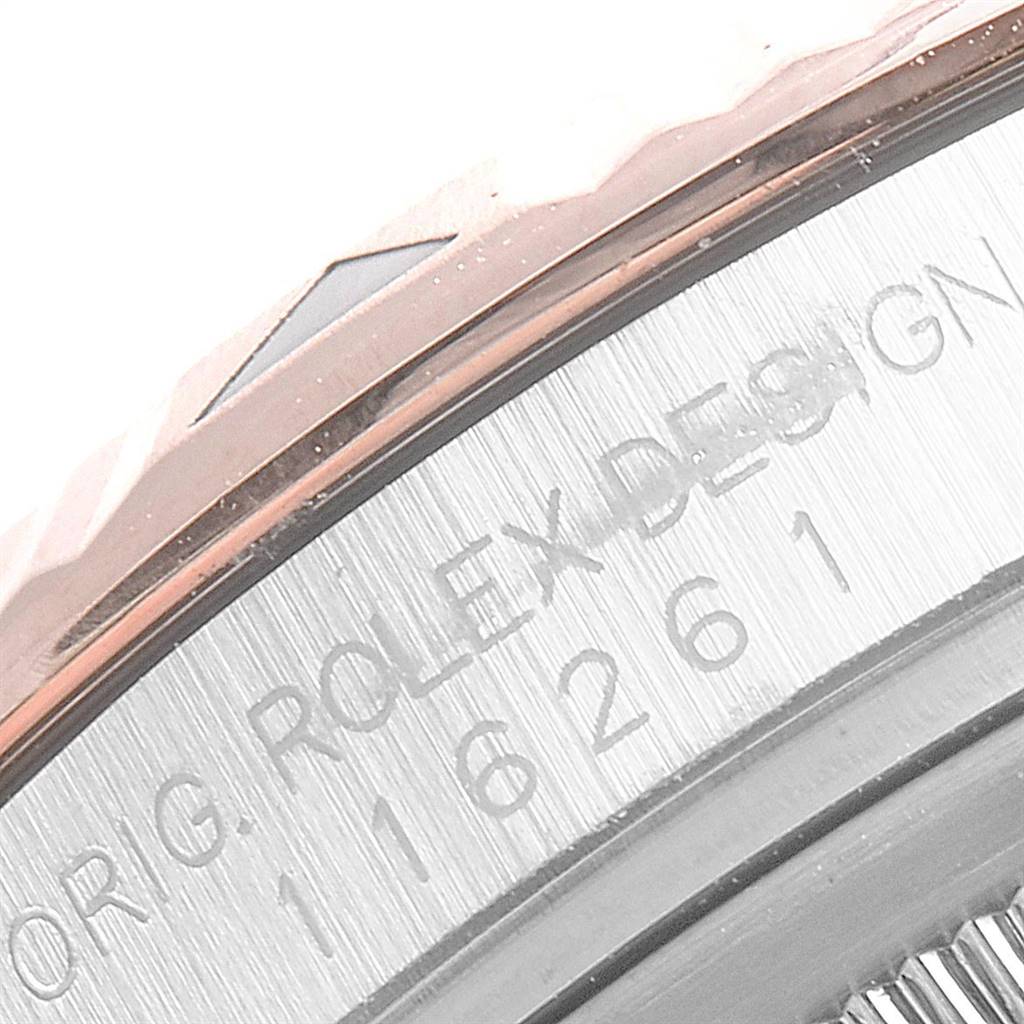 The image shows a close-up of the side and bezel of a Rolex Turn-o-Graph 116261 Men's Steel and Gold (two tone) Silver Dial 116261 Men's Steel and Gold (two tone) Silver Dial, specifically displaying the engraved model number and design details.