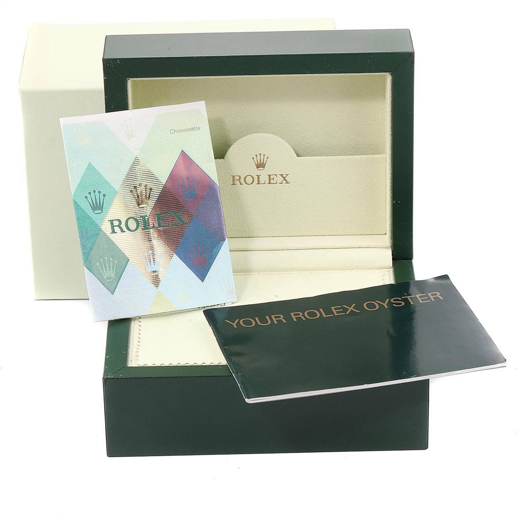 The image shows an open Rolex Turn-o-Graph 116261 Men's Steel and Gold (two tone) Silver Dial 116261 Men's Steel and Gold (two tone) Silver Dial watch box with two booklets in front of it.