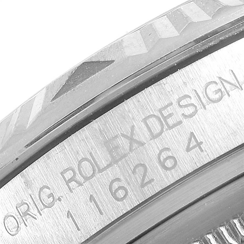 The image shows an angled close-up of the bezel and the serial number engraving on a Rolex Turn-o-Graph 116264 Men's Stainless Steel Black Dial 116264 Men's Stainless Steel Black Dial watch.
