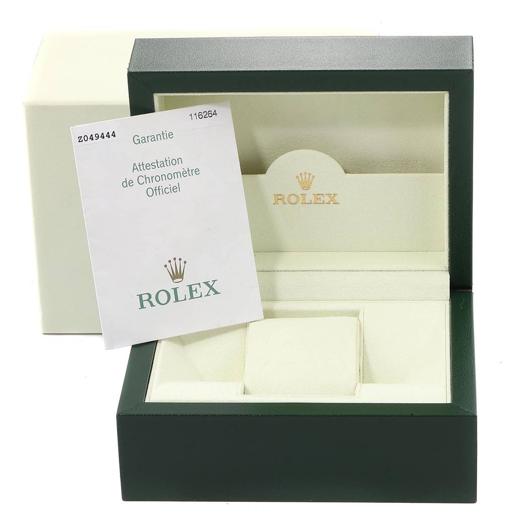 This image shows the open box and warranty card for the Rolex Turn-o-Graph 116264 Men's Stainless Steel Black Dial 116264 Men's Stainless Steel Black Dial model.