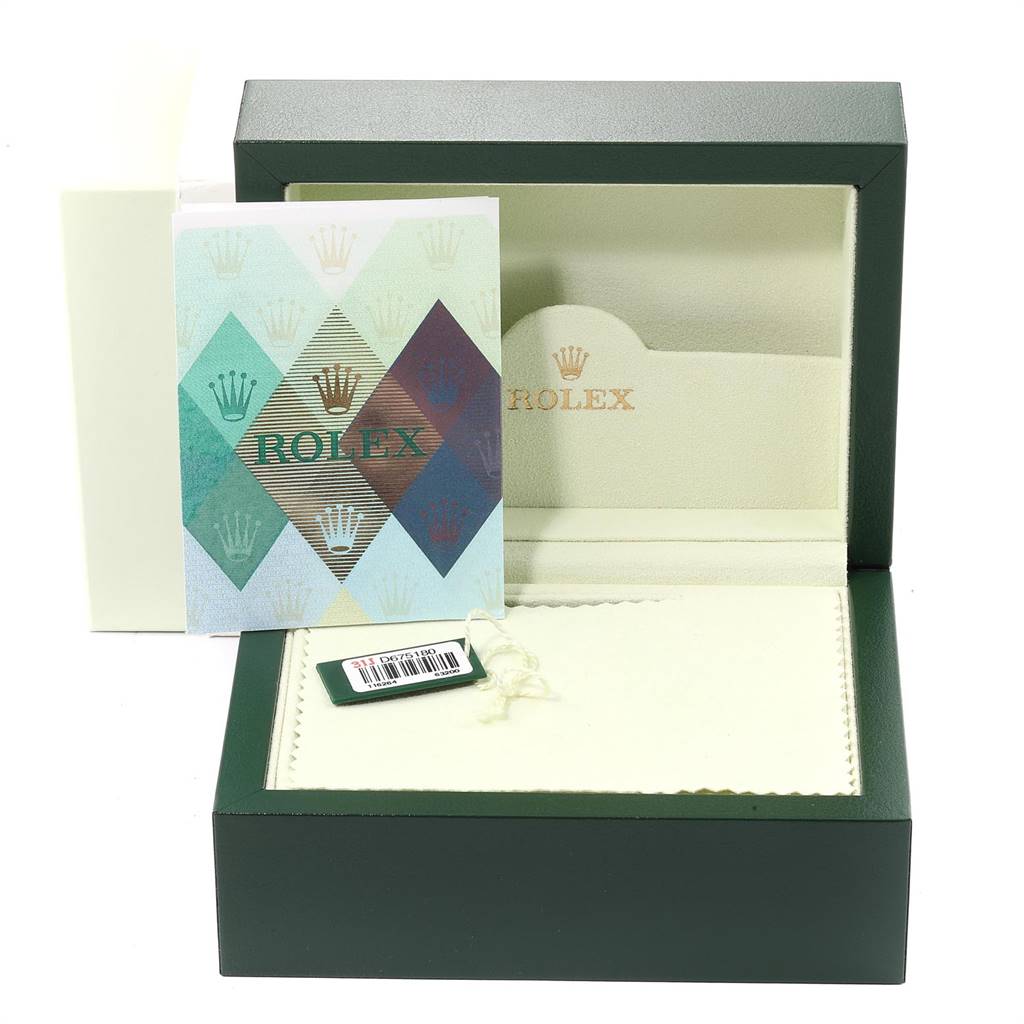 The image shows the packaging and accessories of a Rolex Turn-o-Graph 116264 Men
s Stainless Steel White Dial 116264 Men
s Stainless Steel White Dial watch, including its green box, booklet, and tag.