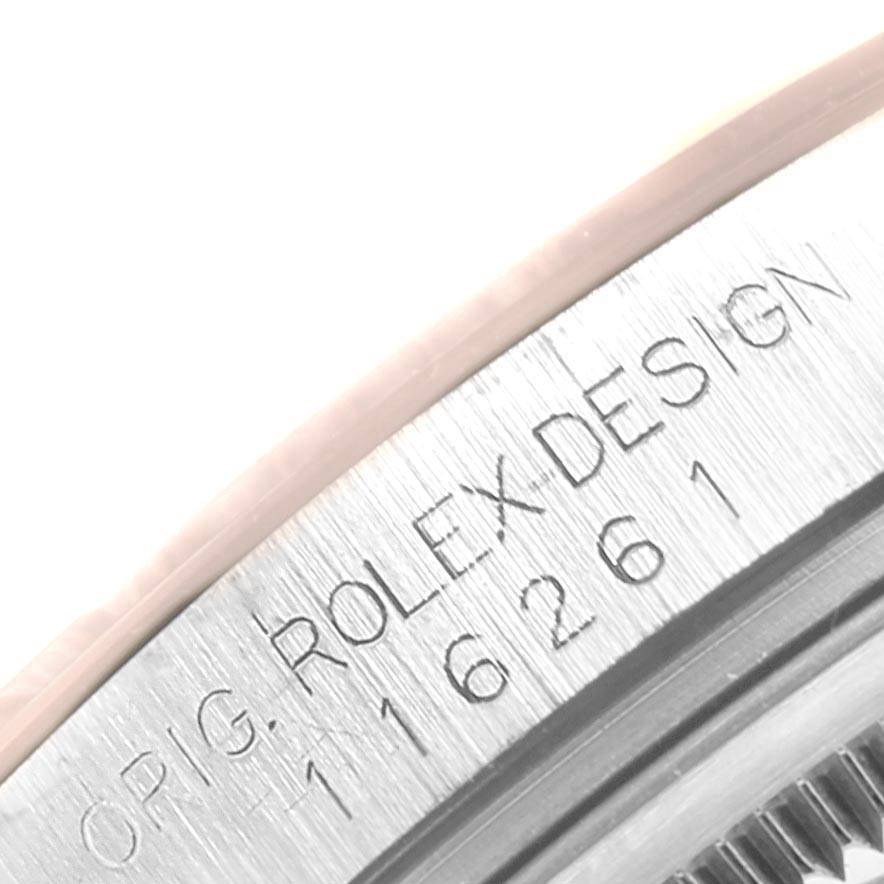 This image shows a close-up of the case, specifically the side of the bezel, of a Rolex Turn-o-Graph 116261 Men
s Stainless Steel Black Dial 116261 Men
s Stainless Steel Black Dial model.