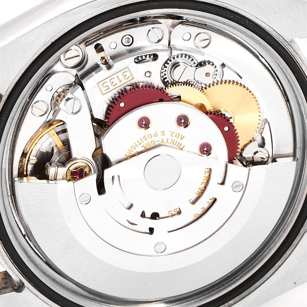 This image shows an internal view of the Rolex Turn-o-Graph 116261 Men
s Stainless Steel Black Dial 116261 Men
s Stainless Steel Black Dial model, highlighting its intricate movement mechanisms.