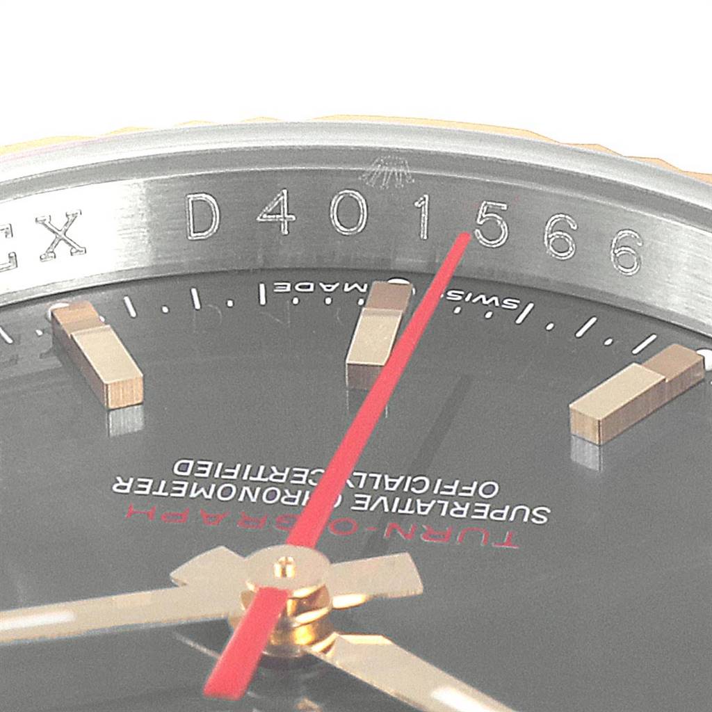 The image shows a close-up of the dial, bezel, and serial number of the Rolex Turn-o-Graph 116263 Men
s Steel and Gold (two tone) Grey Dial 116263 Men
s Steel and Gold (two tone) Grey Dial watch.
