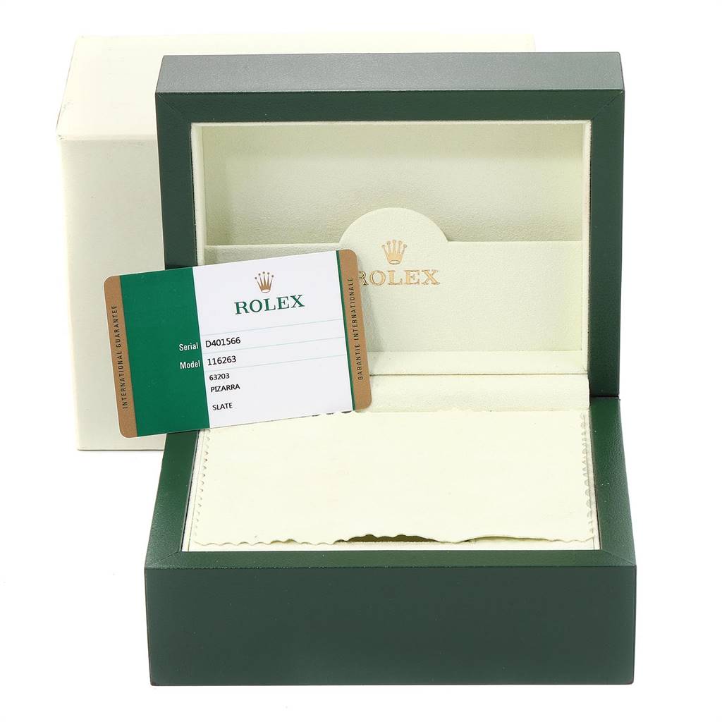 The image shows an empty Rolex watch box for a Turn-o-Graph model, along with its warranty card.