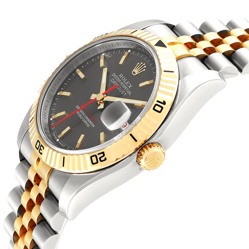The image captures a side-angle view of the Rolex Turn-o-Graph 116263 Men
s Steel and Gold (two tone) Grey Dial 116263 Men
s Steel and Gold (two tone) Grey Dial, showing its bezel, crown, and parts of the bracelet.