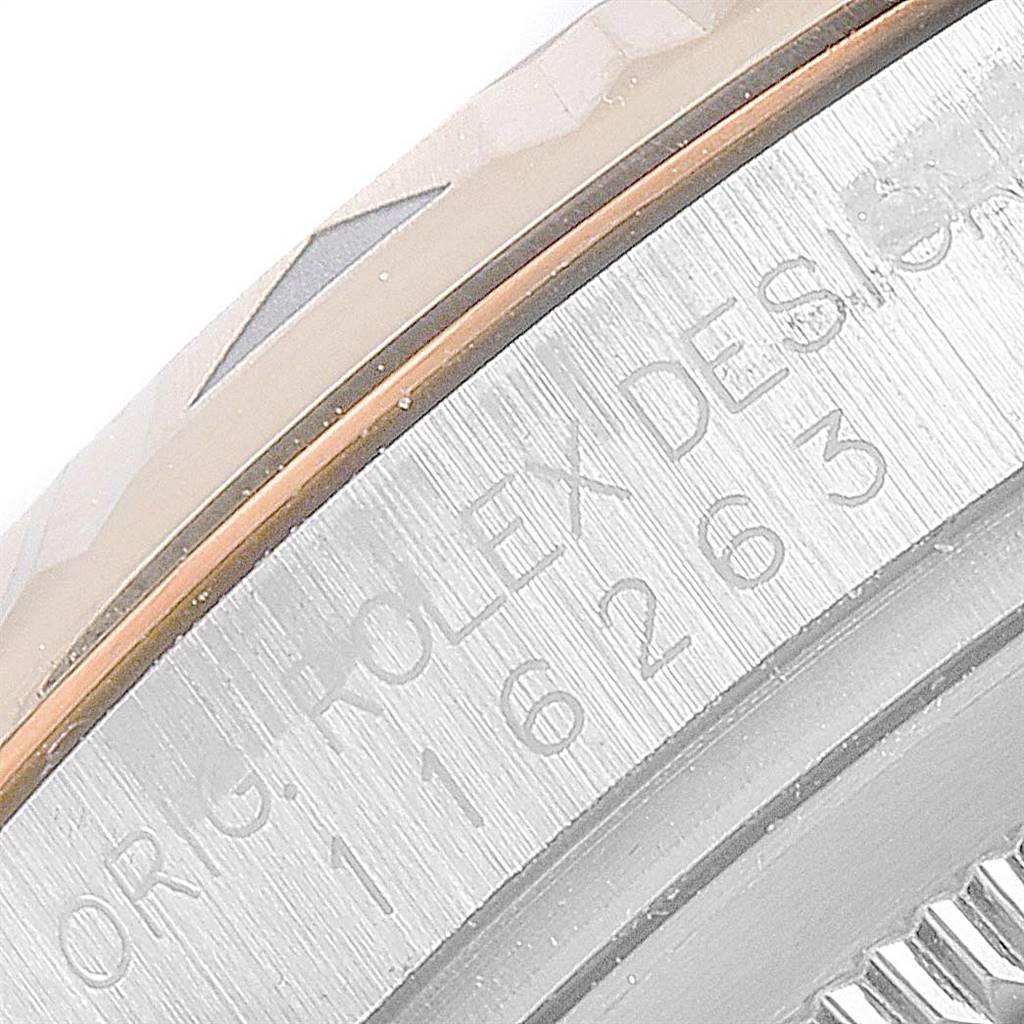 This image shows a close-up view of the side engraving on a Rolex Turn-o-Graph 116263 Men
s Stainless Steel White Dial 116263 Men
s Stainless Steel White Dial watch.