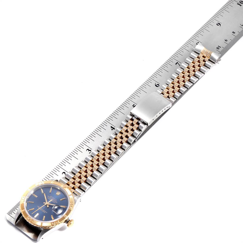 The image shows a top-down angle of the Rolex Turn-o-Graph 16263 Men
s Steel and Gold (two tone) Blue Dial 16263 Men
s Steel and Gold (two tone) Blue Dial watch, displaying the face, bezel, and bracelet.