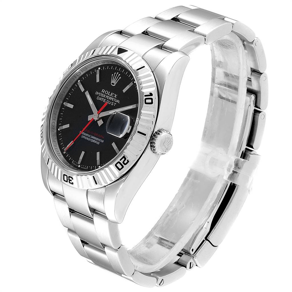 The image shows a side angle of a Rolex Turn-o-Graph 116264 Men
s Stainless Steel Black Dial 116264 Men
s Stainless Steel Black Dial watch displaying the face, bezel, crown, and part of the metal bracelet.