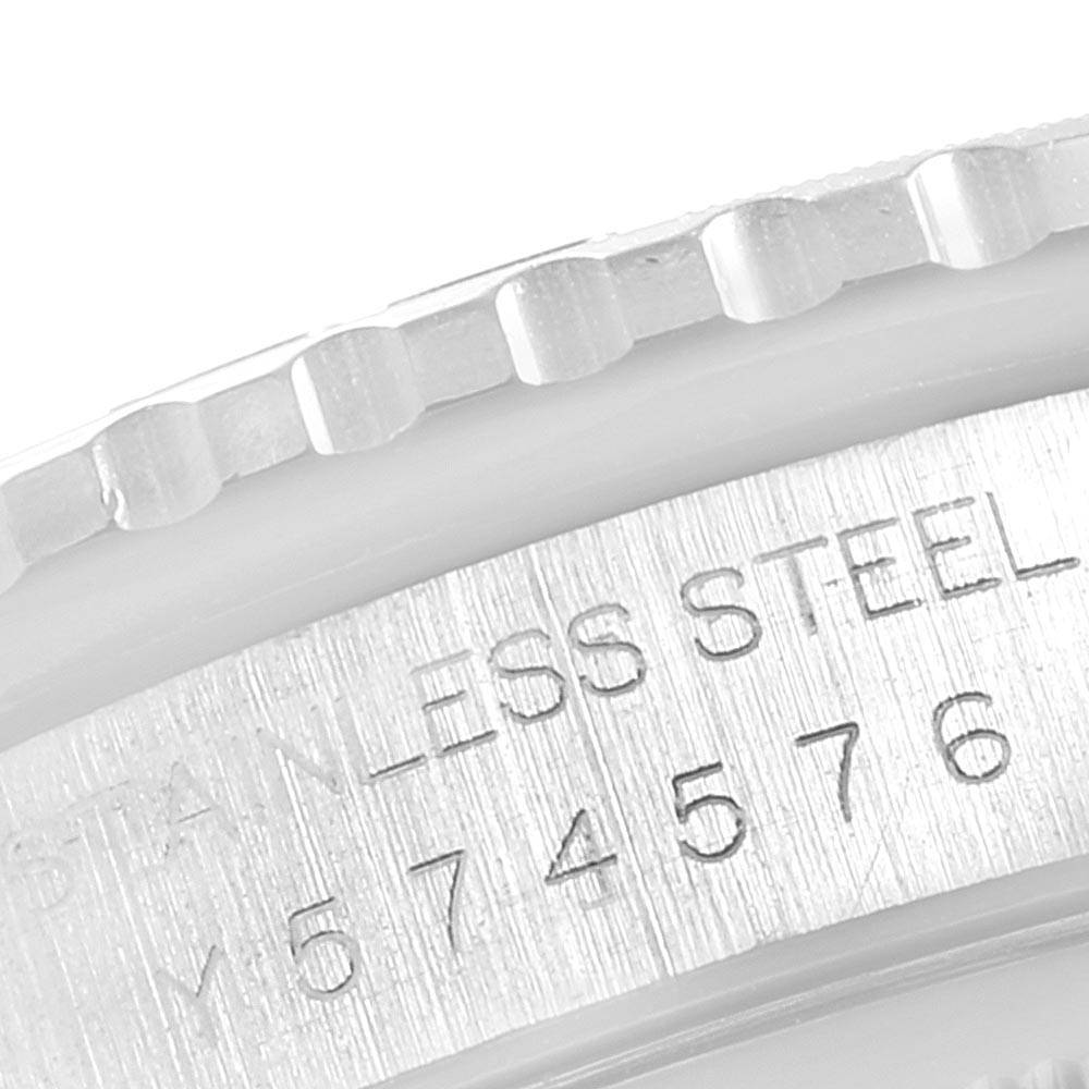 The image shows a close-up angle of the stainless steel bezel and case edge of the Rolex Turn-o-Graph 16264 Men
s Stainless Steel Black Dial 16264 Men
s Stainless Steel Black Dial model watch.