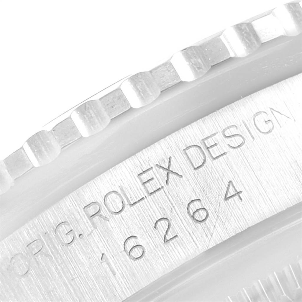 This close-up image shows part of the bezel and the engraved serial number of a Rolex Turn-o-Graph 16264 Men's Stainless Steel Beige Dial 16264 Men's Stainless Steel Beige Dial watch.