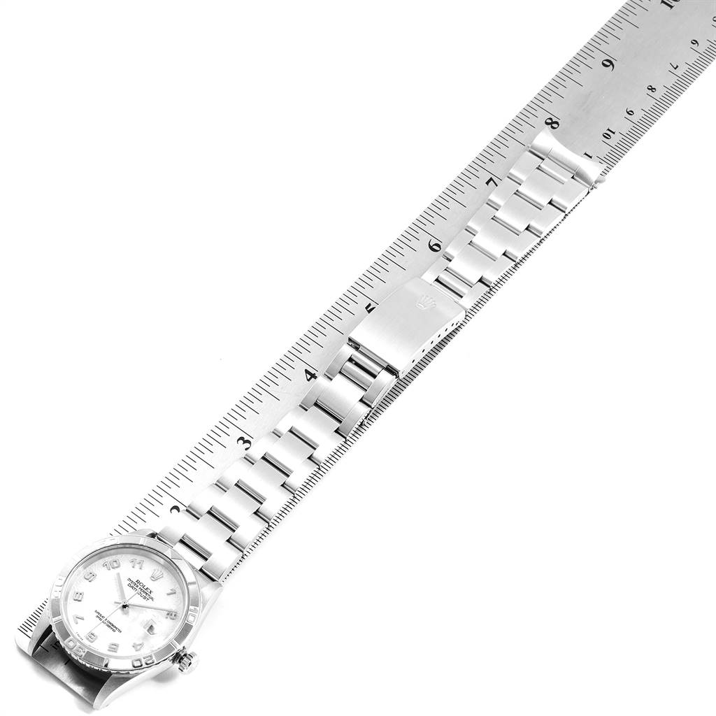 The image shows a top-down view of a Rolex Turn-o-Graph 16264 Men's Stainless Steel Beige Dial 16264 Men's Stainless Steel Beige Dial watch alongside a measuring scale.