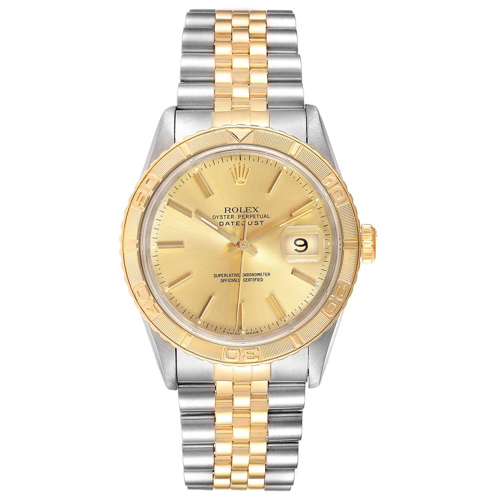 The Rolex Turn-o-Graph 16263 Men
s Steel and Gold (two tone) Champagne Dial 16263 Men
s Steel and Gold (two tone) Champagne Dial watch is shown from a top-down angle, highlighting its gold dial, bezel, and two-tone metal bracelet.