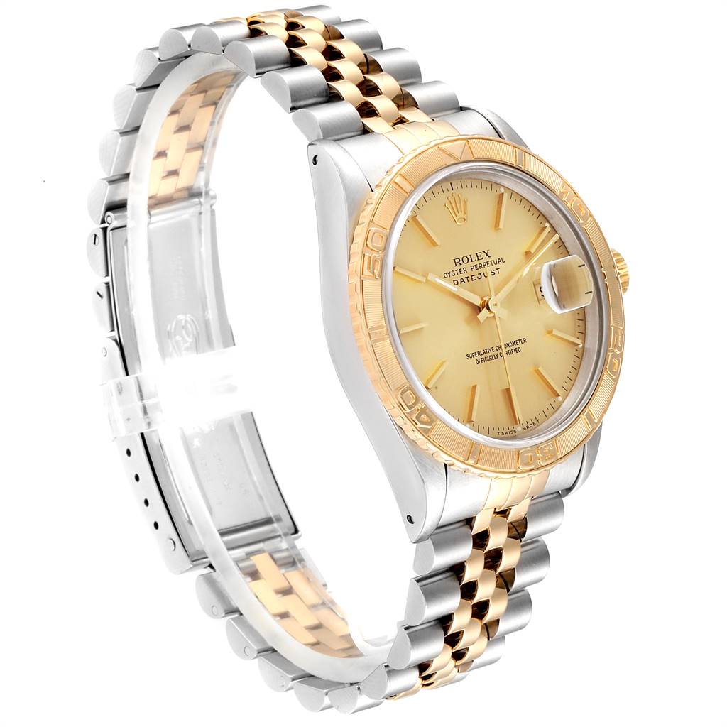 This image shows a side view of the Rolex Turn-o-Graph 16263 Men
s Steel and Gold (two tone) Champagne Dial 16263 Men
s Steel and Gold (two tone) Champagne Dial watch, highlighting its dial, bezel, case, and jubilee bracelet.