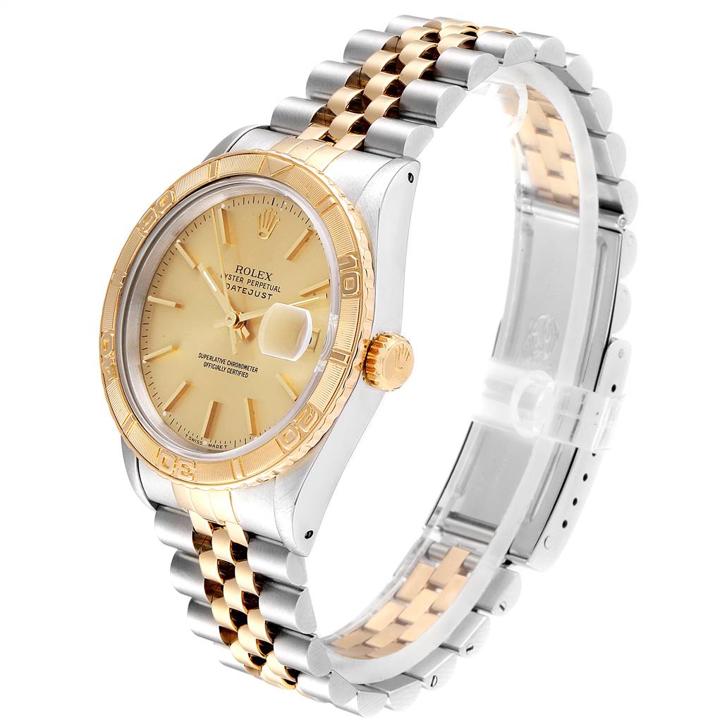 This image shows a Rolex Turn-o-Graph 16263 Men
s Steel and Gold (two tone) Champagne Dial 16263 Men
s Steel and Gold (two tone) Champagne Dial Datejust model at a side angle featuring its dial, bezel, crown, and bracelet.